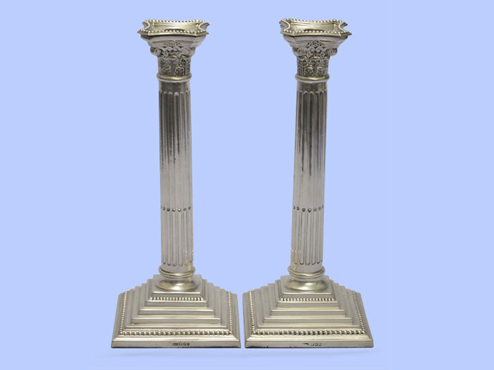 Pair of Large Corinthian Column Silver Candlesticks